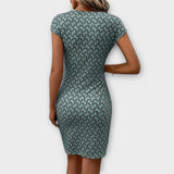 Emma - Vestido de manga corta en forma de tulipán con estampado all-over