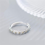 Anillo ajustable de plata y esmaltes pintados a mano con margaritas
