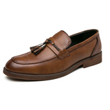Mocasines de piel con borlas